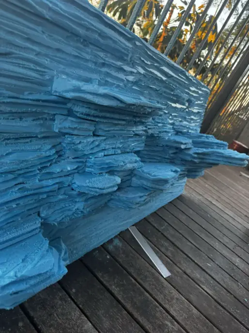 Layers upon layers — four-foot layered rock backdrop being made by hand