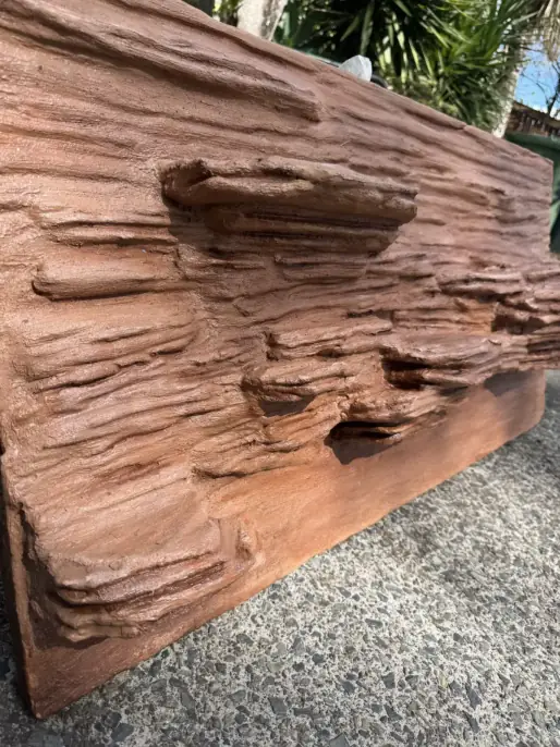 Colour finds the character — four-foot layered rock backdrop being made by hand